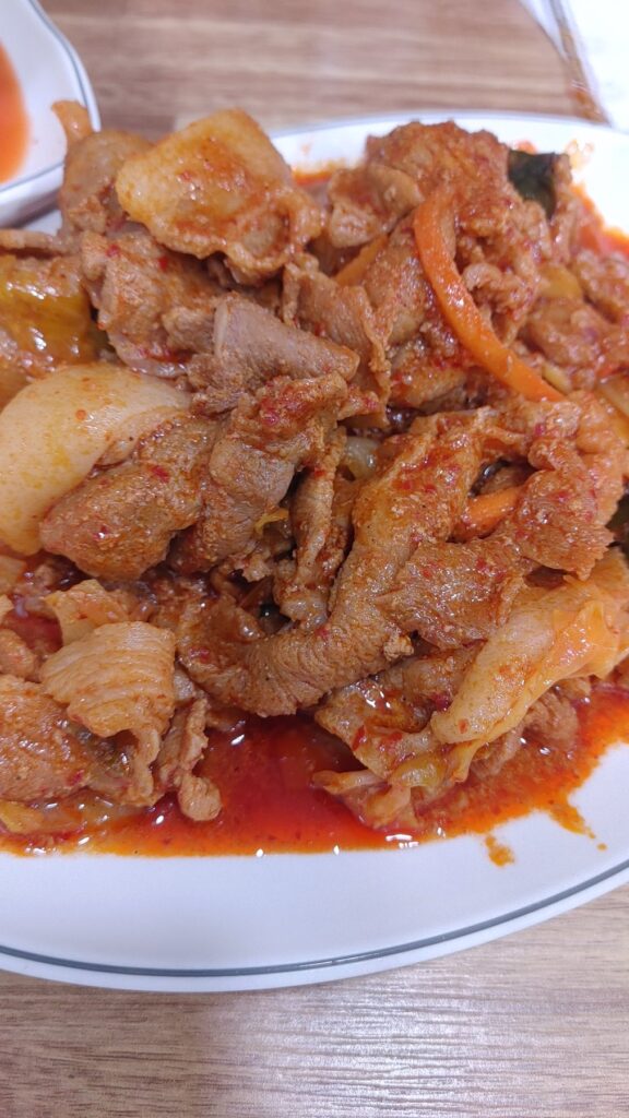 Spicy stir-fried pork with various seasonings added to a spicy red pepper powder sauce - Main Banchan